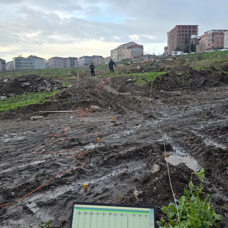 Seismic survey line laid out at an urban transformation site, with a recording computer